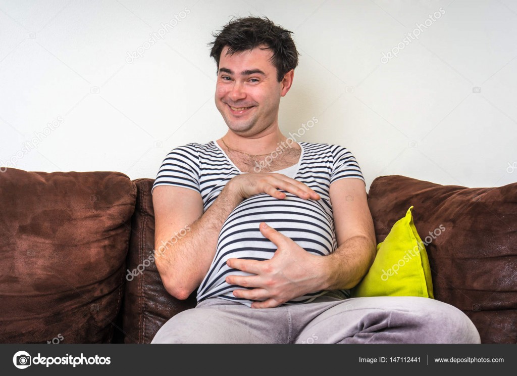 Funny image of pregnant man with pregnant belly